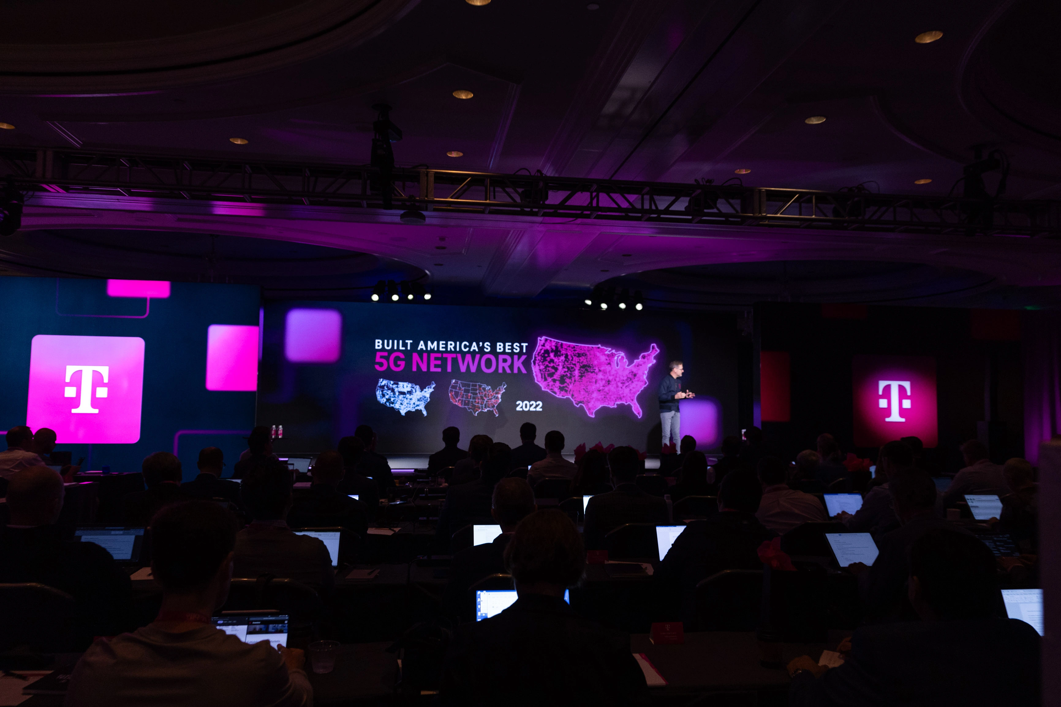 T-Mobile presenter with a Built America's Best 5G Network coverage map slide