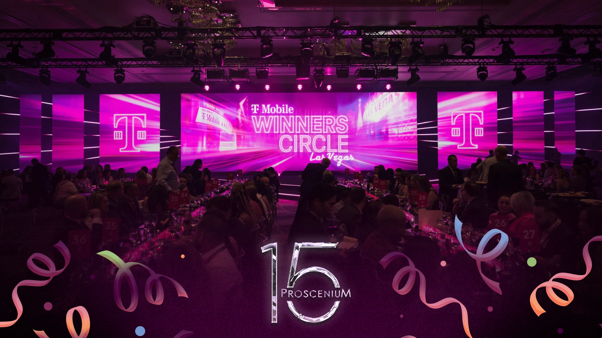 T-Mobile Winners Circle Las Vegas gala dinner facing a magenta LED stage wall, with a Proscenium 15 mark